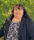 A person in a black jacket

Description automatically generated with low confidence